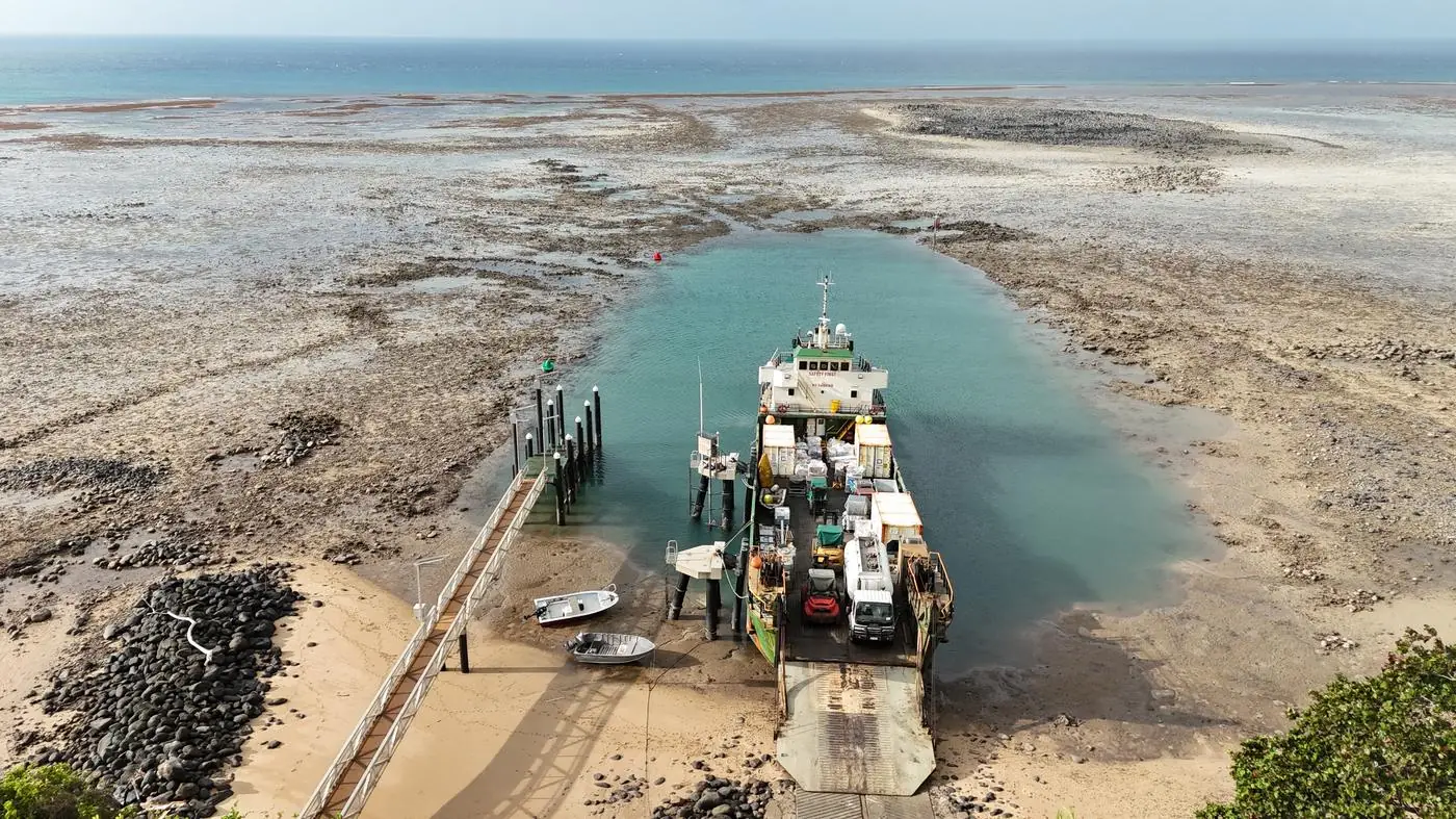 Aerial view of the supply barge at the landing on Ugar (Stephen Island), Torres Strait