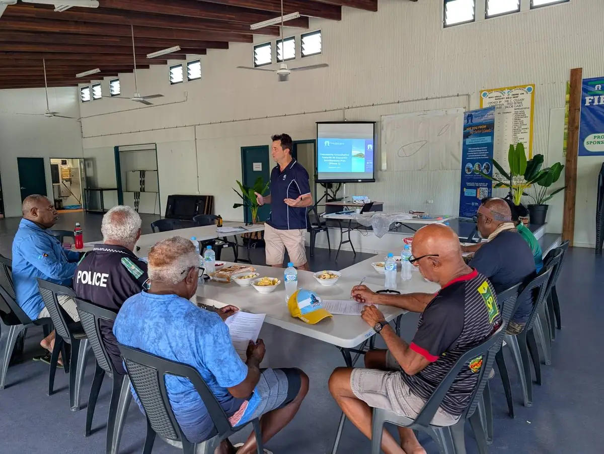 Participants around a table during a workshop session in northern Australia